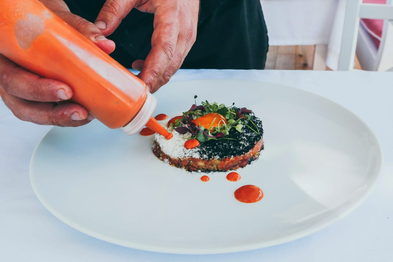 Cooked food on a white ceramic plate.