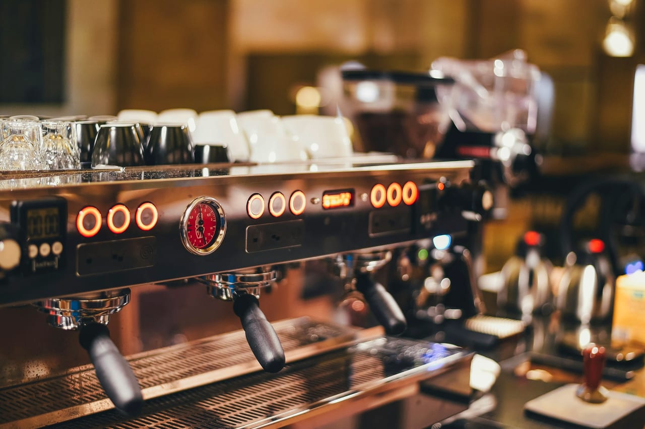 A close view of an espresso machine at work