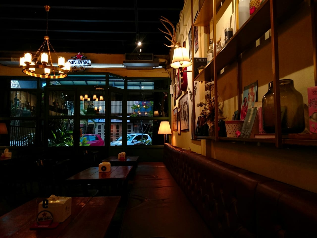 A warm brasserie interior of timber tables and chairs